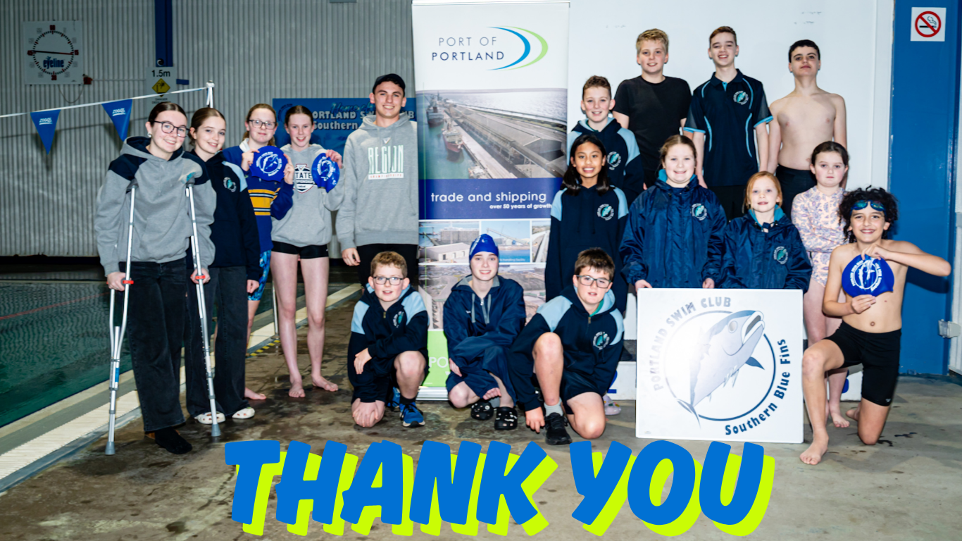 Portland Swimming Club Members standing next to Port of Portland & Portland Swimming Club signs